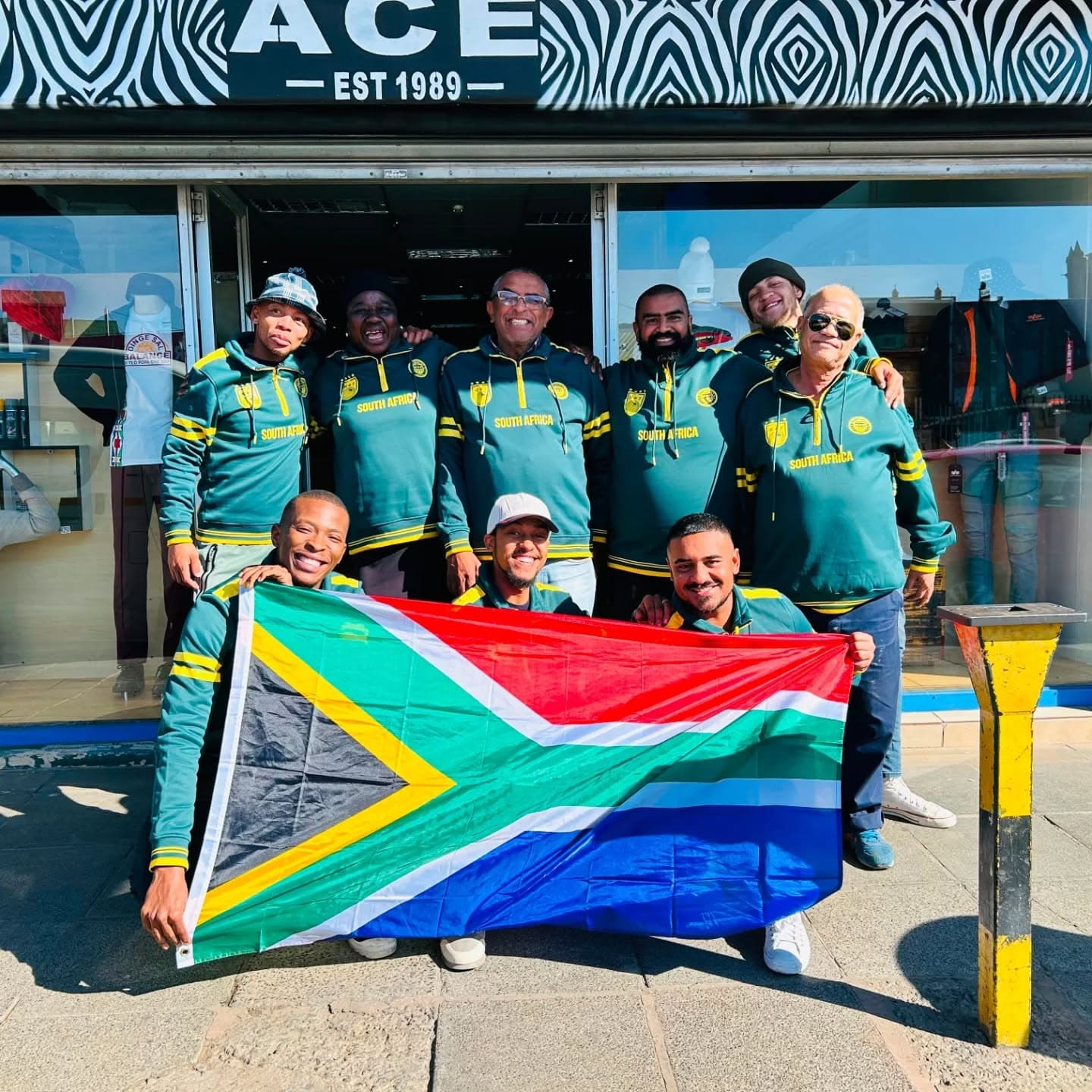 The Ace Outfitters team celebrating with the Kimberley community outside the store